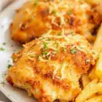 crispy air fryer chicken thighs with garlic parmesan - featured image